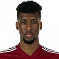 K. Coman