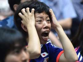 A Japanese football fan reacts as she watches the Women World Cup final between Japan and the US at a public screening in Tokyo on July 6, 2015