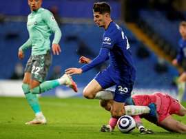 Chelsea cruise, West Ham win as top four race hots up. AFP