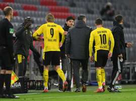 Haaland (L) is expected to be fit for Tuesday's game with Sevilla. AFP