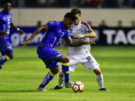 Footballer fined for kissing ball in Ecuador, breaking virus rules. AFP