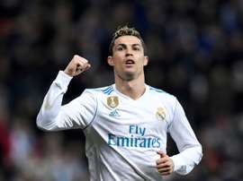 Ronaldo scored a hat-trick as Real cruised to victory over Sociedad. AFP