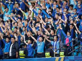Fans of fallen Chinese football champions forced to suffer in silence