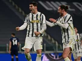 Alvaro Morata (L) got two goals and an assist in Juve's 3-1 win v Lazio. AFP