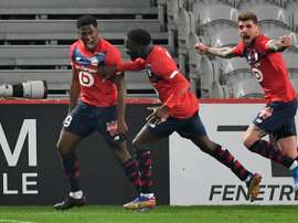 David (L) scored twice for Lille against Marseille. AFP