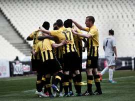 AEK Athens FC players celebrate a goal during a game in Athens on April 4, 2015