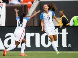 Crystal Dunn (L) celebrates with Alex Morgan after Morgan of the US Womens National Team scored during the second half of a friendly match against Japan on June 5, 2016 in Cleveland, Ohio