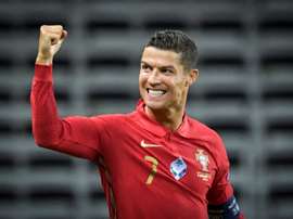 Um jogo centenário: Portugal 100% e Cristiano 101. AFP