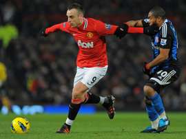 Dimitar Berbatov (L) has become the forwards coach at strugglers Etar. AFP