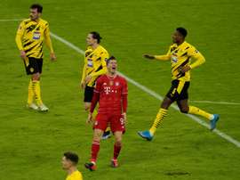 Robert Lewandowski scored thrice in Bayern's win over Dortmund. AFP