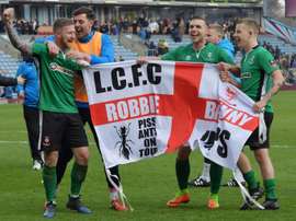 Lincoln City celebrate their FA Cup 5th-round victory against Burnley on Saturday. AFP