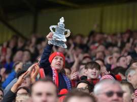 Lincoln fans celebrate after winning . AFP