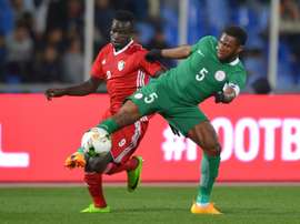 Saifeldin Bakhit (L) playing for Sudan against Nigeria. AFP