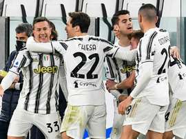 Morata (rear R) scored only his fifth league goal of the season. AFP