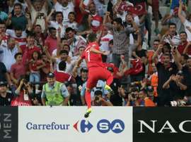 Turkeys midfielder Oguzhan Ozyakup celebrates after scoring a goal against Netherlands during a Euro 2016 qualifying match at the Arena Stadium in Konya, on September 6, 2015 in Konya