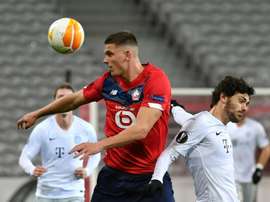 L1: Lille-Reims, le roc Botman face au buteur Dia. AFP