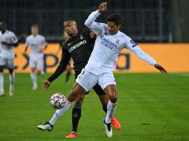Alassane Plea (L) has got coronavirus. AFP