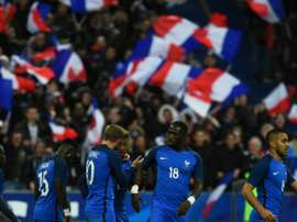 Kingsley Coman et ses coéquipiers célèbrent son but de 4-2 face à la Russie au Stade de France, le 29 mars 2016