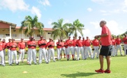 Jugadores de Los Leones del Escogido participan de la práctica del béisbol. EFE/Archivo