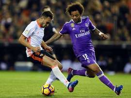 Munir El Haddadi à la lutte avec le Brésilien du Real Madrid Marcelo. EFE