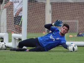 Rossi paró un penalti a Junior este año. BocaJrs
