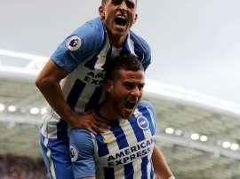 Knockaert celebrates with Tomer Hemed. Twitter/BHAFC