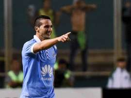 Gastón Cellerino celebra un gol con Bolívar. AFP